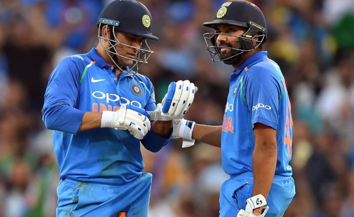 3kollqe Rohit Sharma Ms Dhoni Afp 625x300 28 December 20.jpg